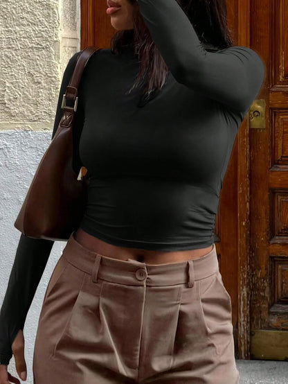 INAWLY T-shirt ajusté à manches longues et col ras-du-cou de couleur unie pour femmes