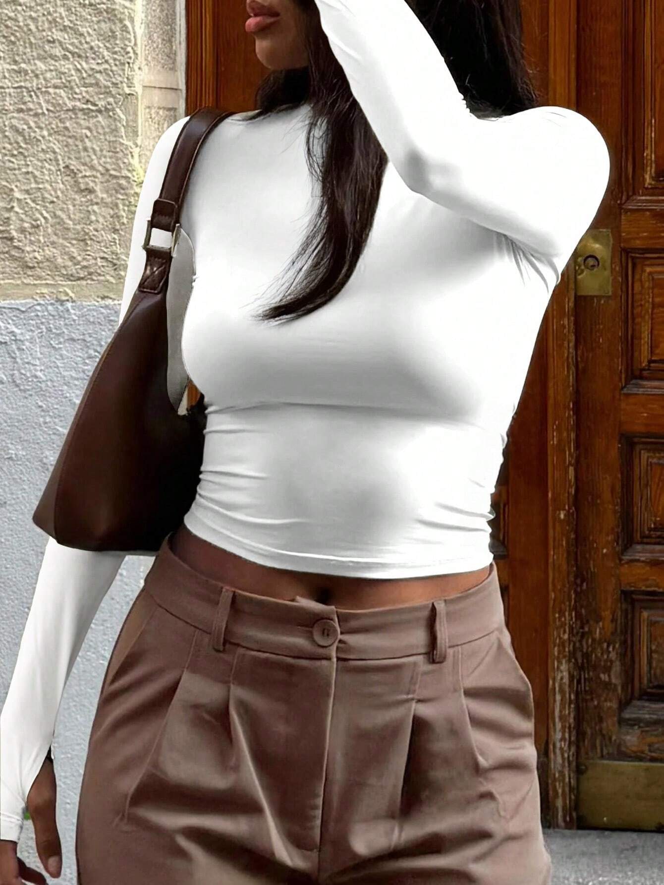 INAWLY T-shirt casual à manches longues col rond de couleur unie pour femmes, printemps été