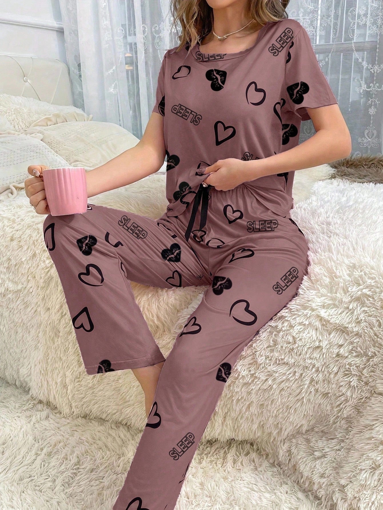 Women's Cute and Comfortable 2-Piece Pajama Set featuring a short-sleeve